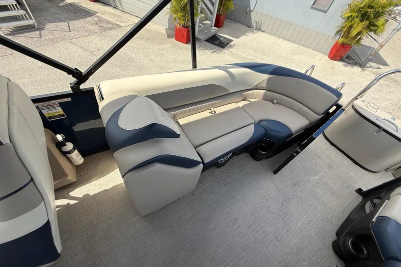 Slide: The Image of 2025 Avalon 2385 LSZ Quad Lounger interior with plush seating and modern design. - 34