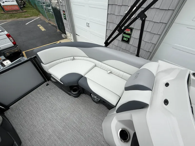 Slide: The Image of 2025 Avalon LSZ Quad Lounger interior with gray seating and modern design. - 14