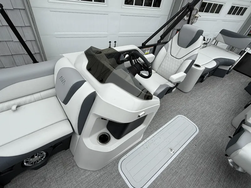 Slide: The Image of 2025 Avalon LSZ Quad Lounger interior with sleek seating and modern helm design. - 16