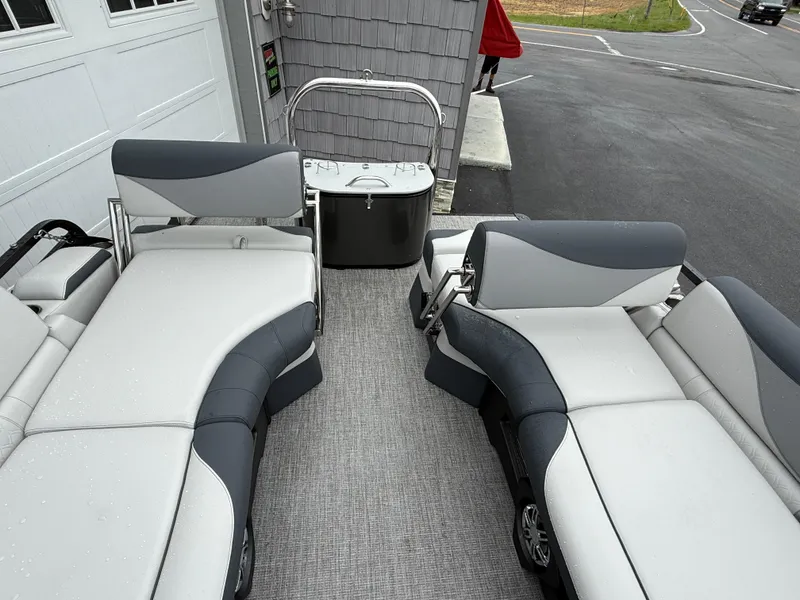 Slide: The Image of 2025 Avalon LSZ Quad Lounger interior with gray and white seating, showcasing luxury and comfort. - 24
