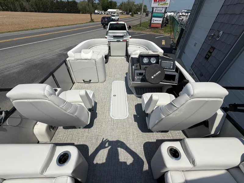 Slide: The Image of 2025 Avalon 2385 Catalina Quad Lounger, Tri Toon High Performance boat interior with plush seating. - 13