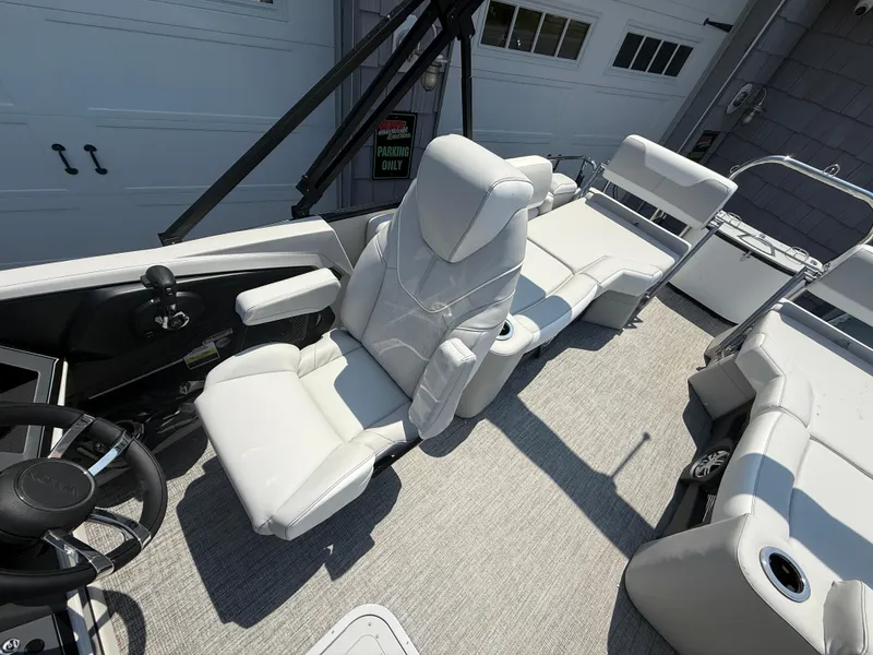 Slide: The Image of 2025 Avalon 2385 Catalina Quad Lounger with luxurious white seating and modern design. - 19