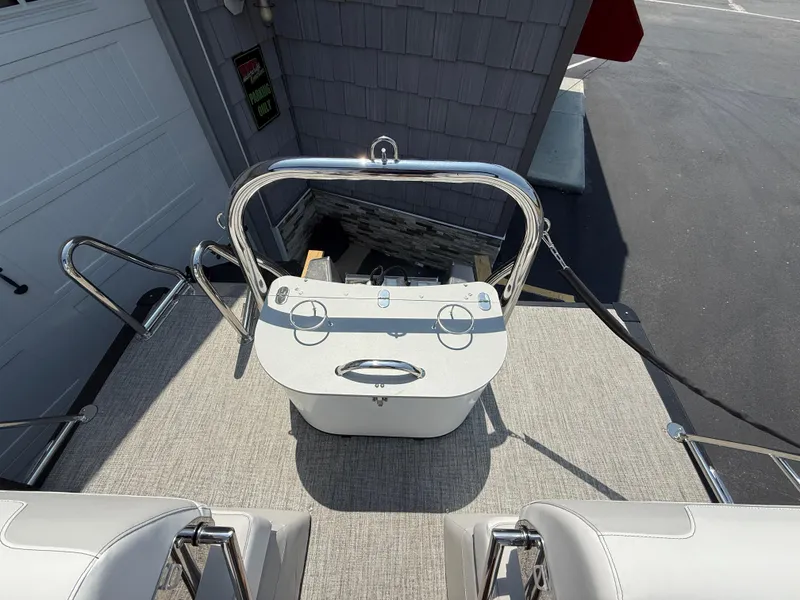 Slide: The Image of 2025 Avalon 2385 Catalina Quad Lounger helm with sleek design and modern controls. - 27