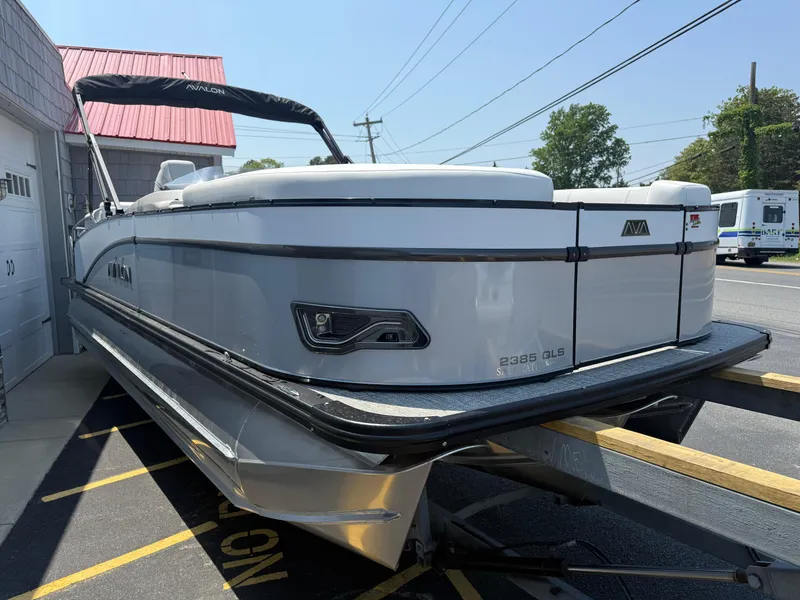 Slide: The Image of 2025 Avalon 2385 Catalina Quad Lounger, Tri Toon High Performance boat on trailer. - 7