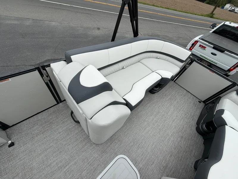 Slide: The Image of 2025 Avalon 2385 Catalina Quad Lounger interior with plush seating and modern design. - 12