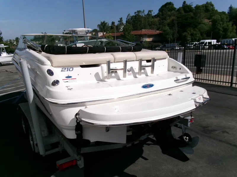 Slide: The Image of 2007 Chaparral 210 SSi boat on trailer, rear view, in outdoor setting. - 2