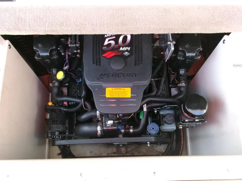 Slide: The Image of Engine compartment of a 2007 Chaparral 210 SSi with a Mercury 5.0 MPI engine. - 23