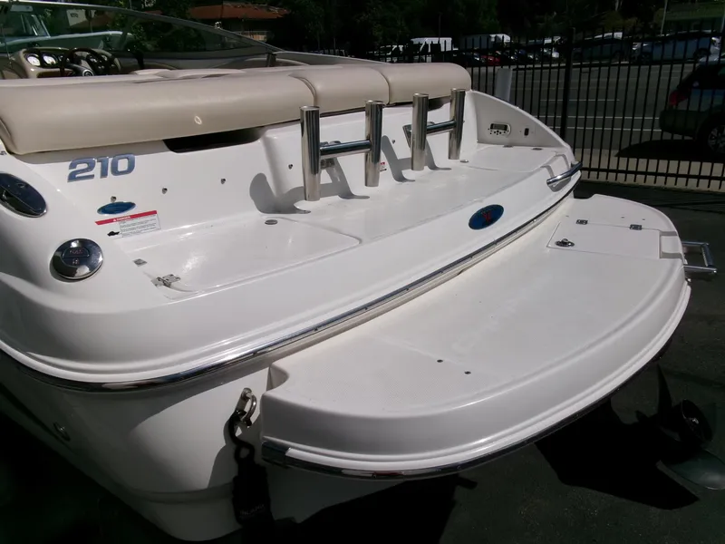 Slide: The Image of 2007 Chaparral 210 SSi boat rear view with swim platform and seating. - 26