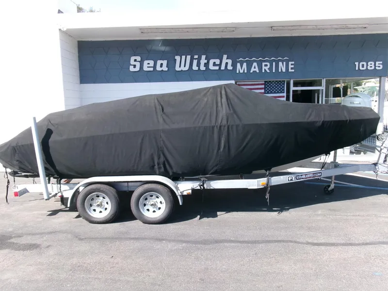 Slide: The Image of 2007 Chaparral 210 SSi boat covered on trailer at Sea Witch Marine. - 29