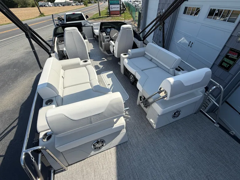Slide: The Image of 2025 Avalon Catalina Quad Lounger with windshield, featuring spacious seating and modern design. - 10