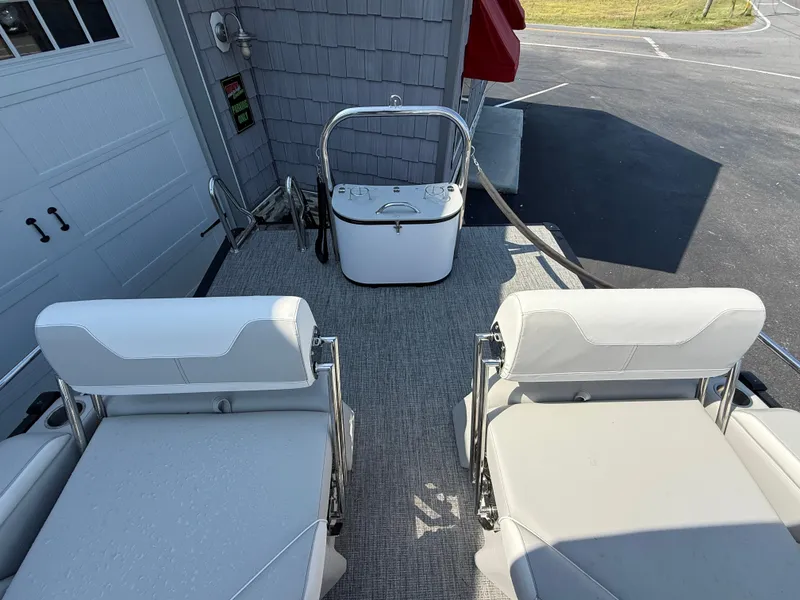 Slide: The Image of 2025 Avalon Catalina Quad Lounger with Shift Windshield, featuring comfortable seating and modern design. - 24