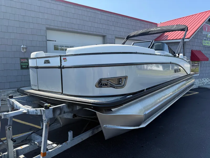 Slide: The Image of 2025 Avalon Catalina Quad Lounger Shift Windshield pontoon boat on trailer. - 3