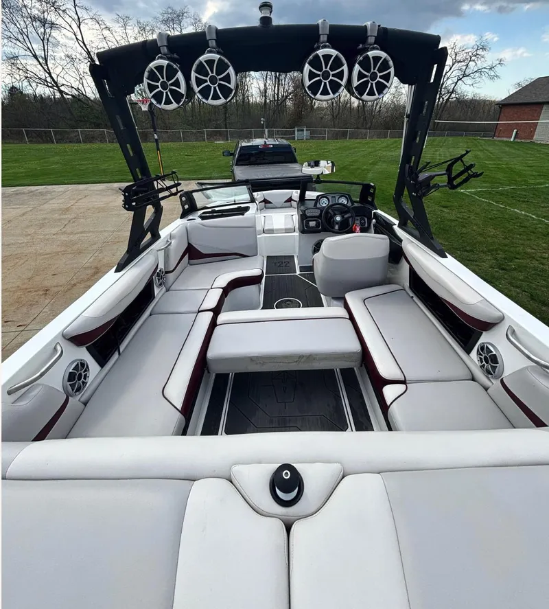 Slide: The Image of 2018 Axis T 22 boat with spacious seating and advanced audio system. - 10