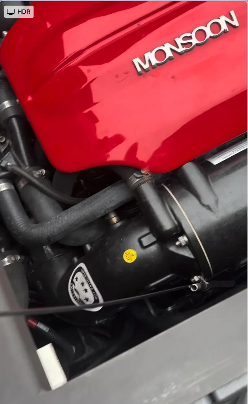 Slide: The Image of Close-up of a 2018 Axis T 22 engine with Monsoon branding. - 13