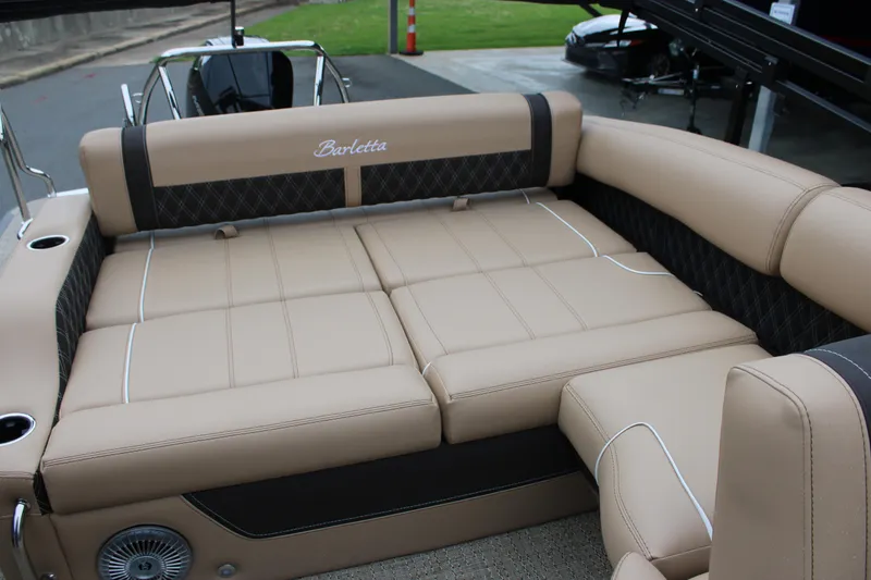 Slide: The Image of Luxurious seating on 2025 Barletta Lusso 23U pontoon boat, featuring beige upholstery. - 17