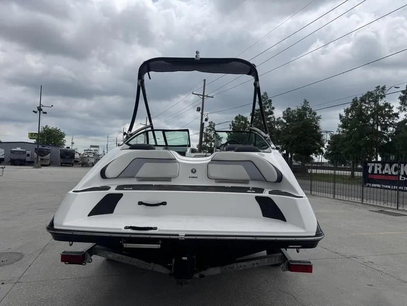 Slide: The Image of 2015 Yamaha AR190 boat on trailer under cloudy sky. - 13