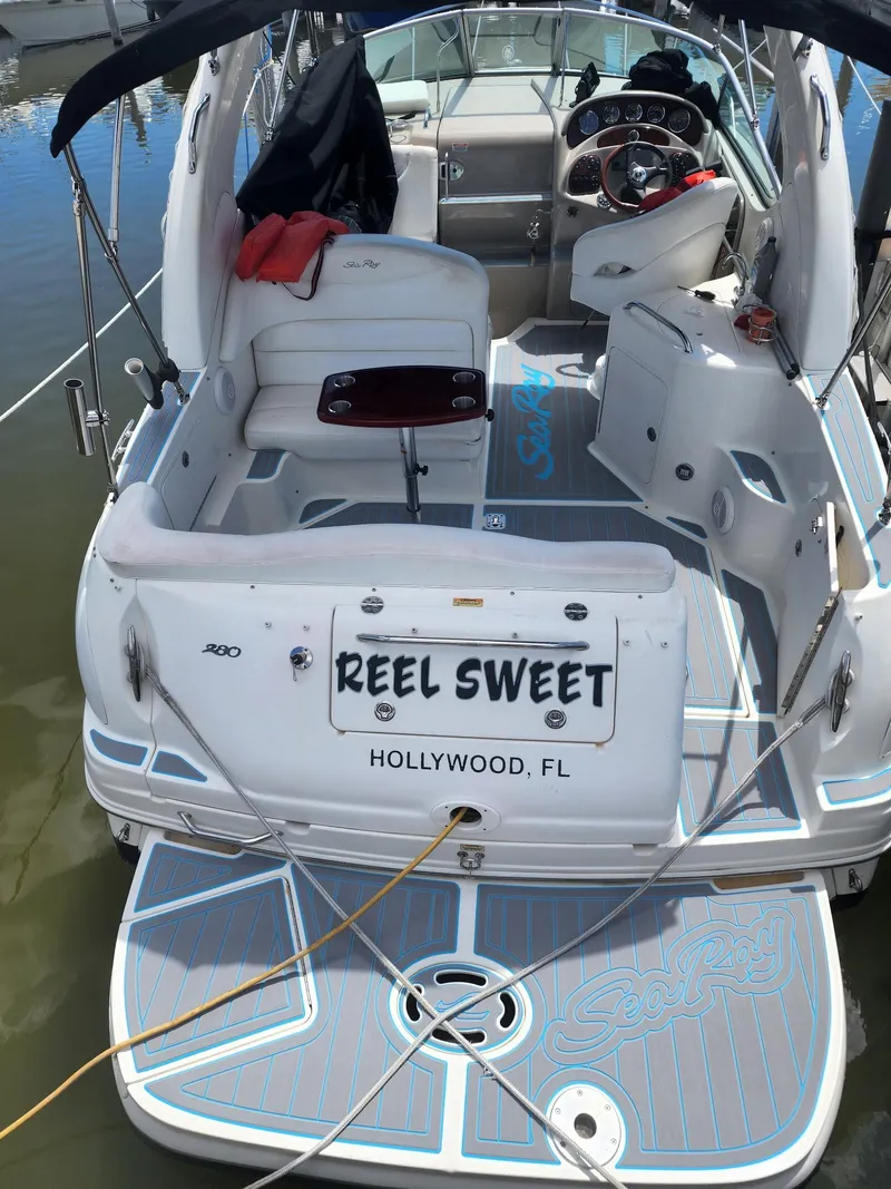 Slide: The Image of 2007 Sea Ray 280 Sundancer boat named "Reel Sweet" docked in Hollywood, FL. - 4