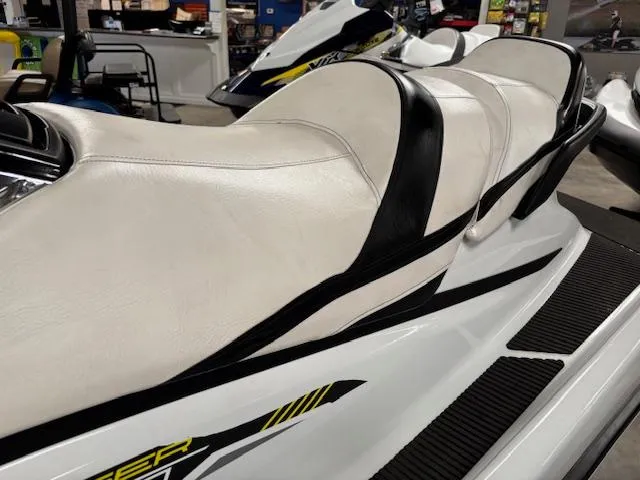 Slide: The Image of 2017 Yamaha WaveRunner VX Cruiser HO 1.8 with white and black seating in showroom. - 3