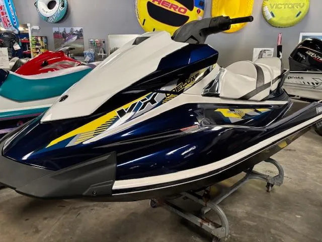 Slide: The Image of 2017 Yamaha WaveRunner VX Cruiser HO 1.0 in showroom, blue and white design. - 3