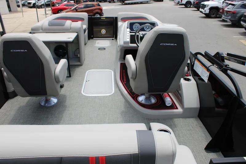 Slide: The Image of 2025 Barletta Corsa 23UC boat interior with modern seating and dashboard design. - 24