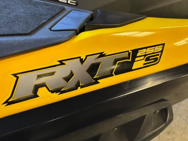 Slide: The Image of 2009 Sea-Doo RXT iS 255 logo on yellow watercraft body. - 6