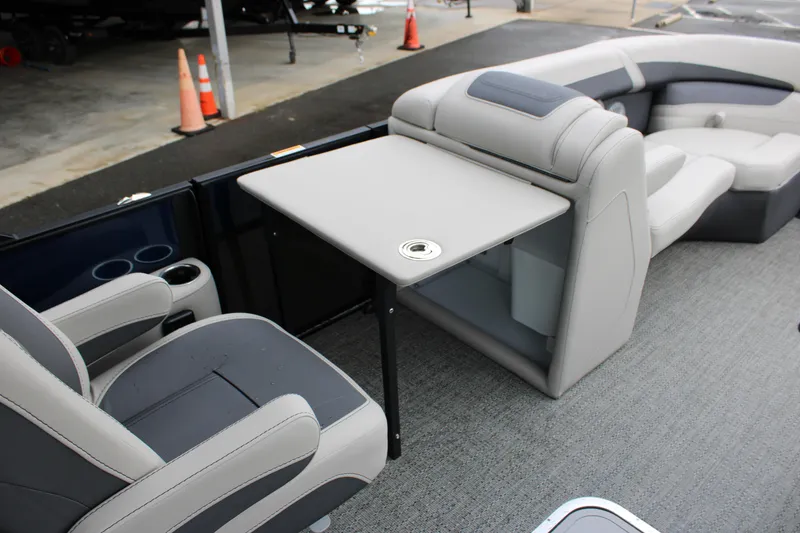 Slide: The Image of 2025 Barletta Cabrio 22QC interior with seating and table setup. - 11