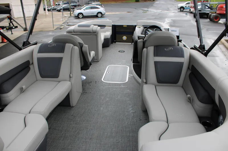 Slide: The Image of 2025 Barletta Cabrio 22QC pontoon boat interior with gray seating and modern design. - 5