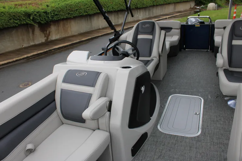Slide: The Image of 2025 Barletta Cabrio 22QC pontoon boat interior with plush seating and modern design. - 7