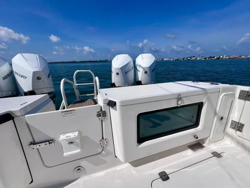 Slide: The Image of 2022 World Cat 400 CC-X boat with quad Mercury engines on a sunny day. - 17