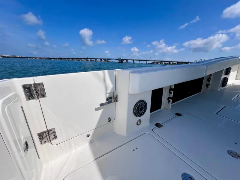 Slide: The Image of 2022 World Cat 400 CC-X boat deck with ocean view and clear blue sky. - 19
