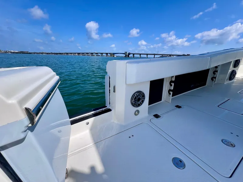 Slide: The Image of 2022 World Cat 400 CC-X boat deck with ocean view and clear blue sky. - 20