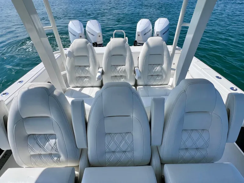 Slide: The Image of Luxury seating on 2022 World Cat 400 CC-X boat with quad engines. - 34