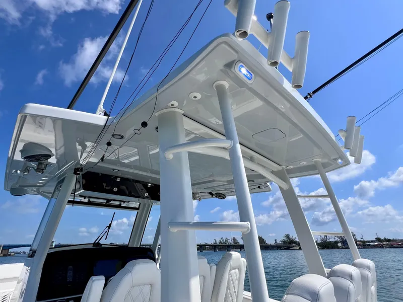 Slide: The Image of 2022 World Cat 400 CC-X boat, featuring sleek design and advanced joystick controls. - 36