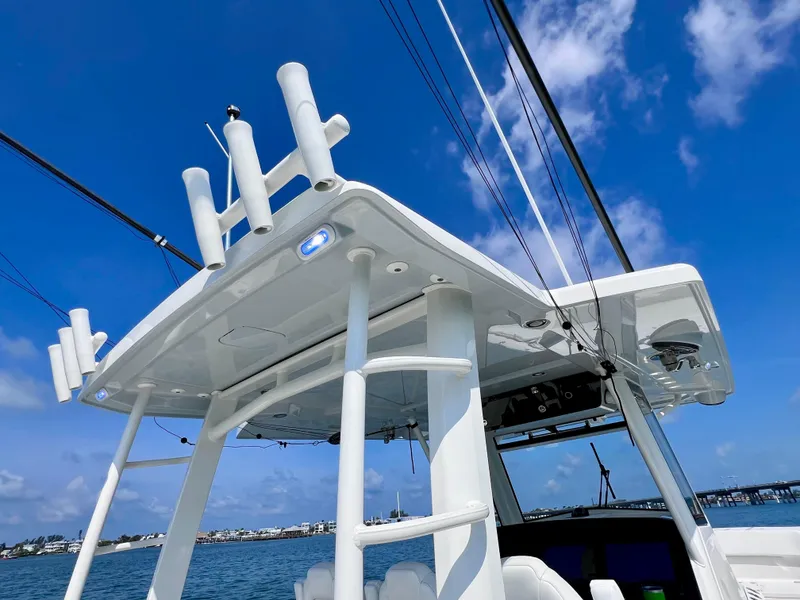 Slide: The Image of 2022 World Cat 400 CC-X boat with night vision and joystick, under clear blue sky. - 37