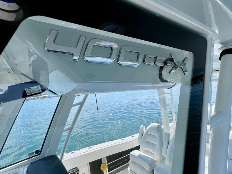 Slide: The Image of 2022 World Cat 400 CC-X boat interior with sleek design and comfortable seating. - 40