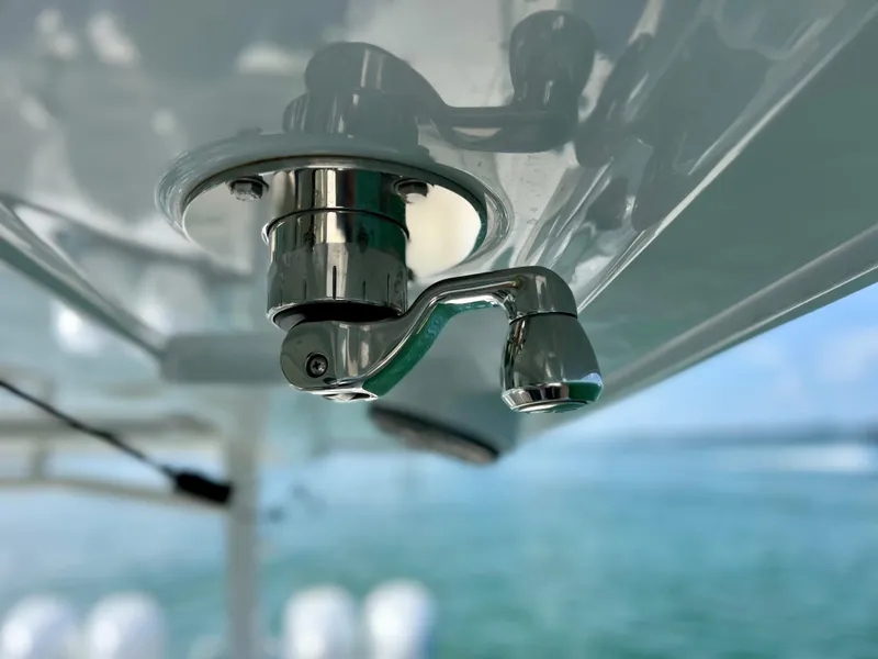 Slide: The Image of Close-up of a chrome fixture on a 2022 World Cat 400 CC-X boat. - 41