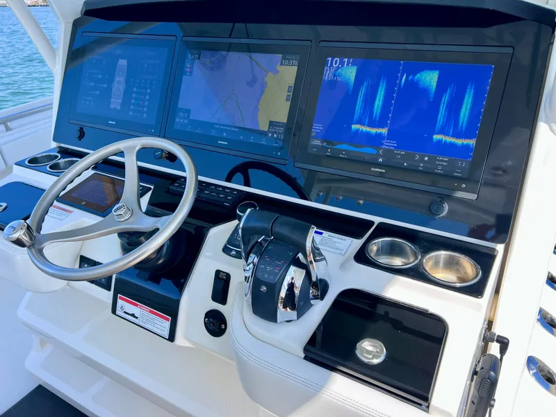 Slide: The Image of Control panel of 2022 World Cat 400 CC-X with joystick and night vision displays. - 44