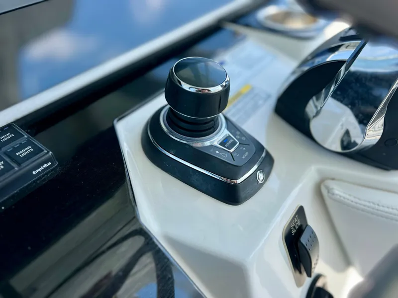 Slide: The Image of Joystick control on 2022 World Cat 400 CC-X boat dashboard, featuring night vision technology. - 46