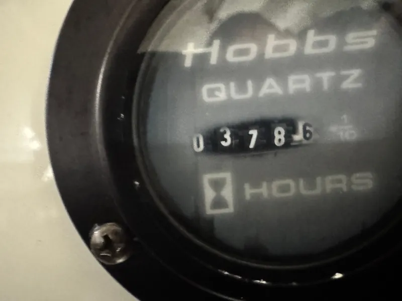 Slide: The Image of Hobbs Quartz hour meter showing 378.6 hours on a 2007 Cobalt 272 BR. - 17