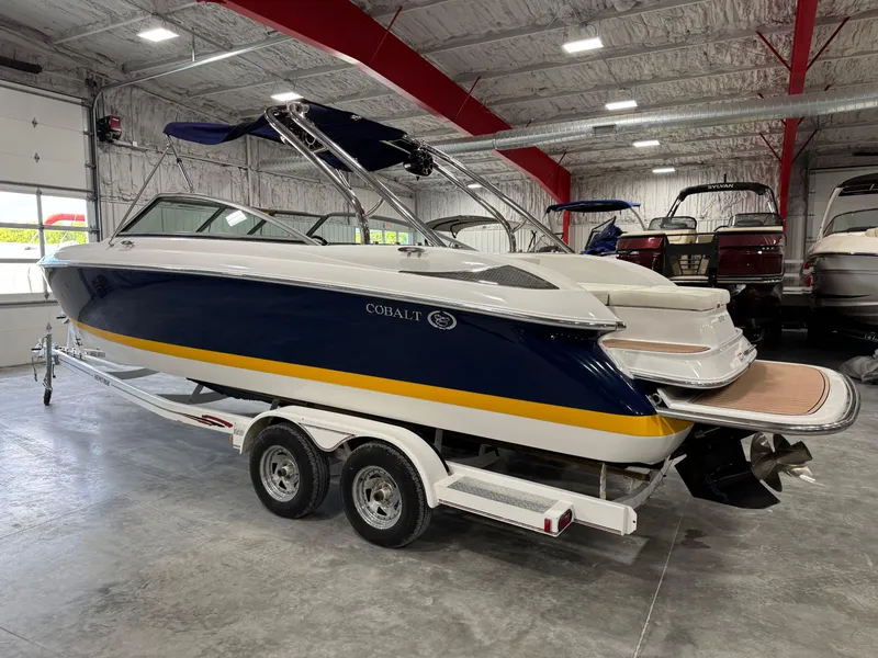 Slide: The Image of 2007 Cobalt 272 BR boat on trailer in indoor storage facility. - 3