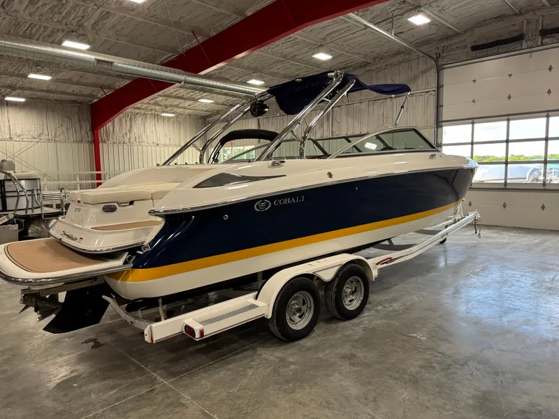 Slide: The Image of 2007 Cobalt 272 BR boat on trailer in indoor storage facility. - 4