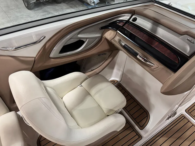 Slide: The Image of Luxurious interior of a 2007 Cobalt 272 BR boat with plush seating and elegant dashboard. - 7
