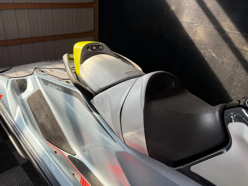 Slide: The Image of Close-up of 2024 Sea-Doo RXT-X 325 Tech Package seat area. - 5
