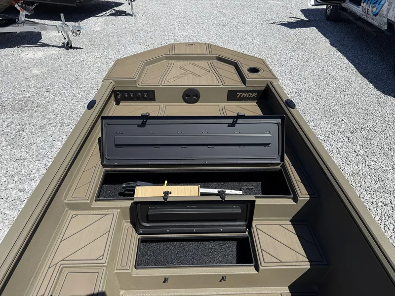 Slide: The Image of 2025 Thor Lake Hammer 1754 Timber Hammer boat with open storage compartments. - 4