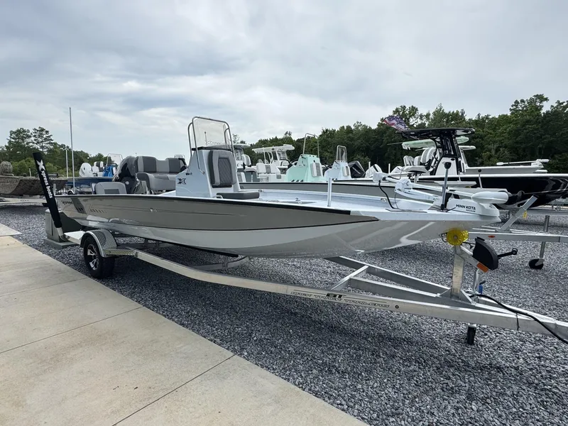 Slide: The Image of 2025 Xpress Hyper-Lift Series H20B boat on trailer, displayed outdoors. - 1