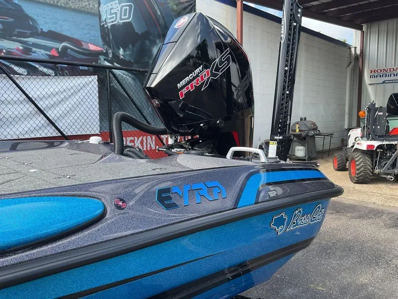 Slide: The Image of 2025 Bass Cat Eyra boat with Mercury Pro XS engine, blue and black design. - 23