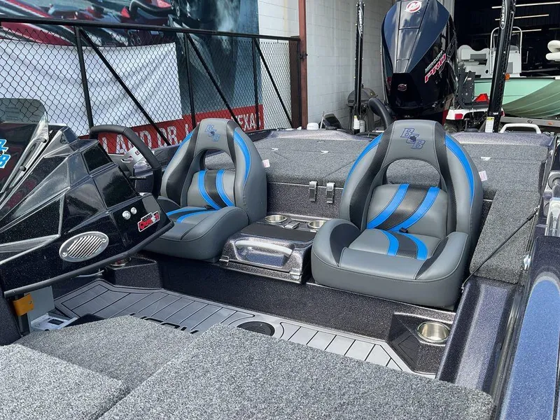Slide: The Image of 2025 Bass Cat Eyra boat interior with sleek seats and modern dashboard design. - 26