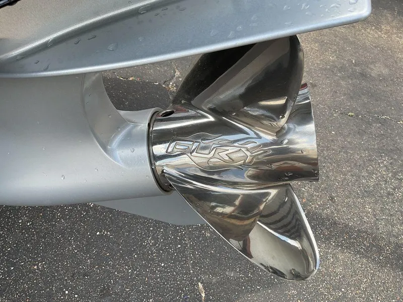 Slide: The Image of Close-up of a 2025 Bass Cat Eyra boat propeller with "Fury" branding. - 8