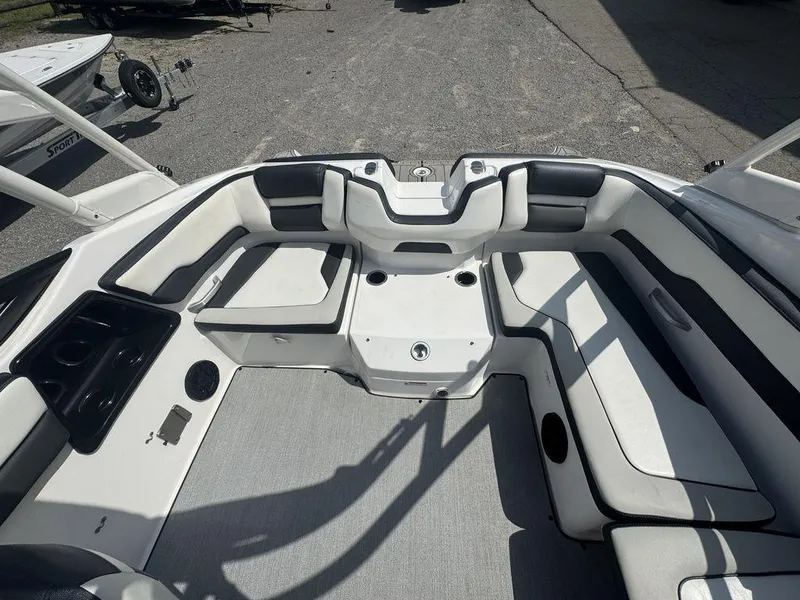 Slide: The Image of 2021 Yamaha Boats AR195 interior with spacious seating and modern design. - 6