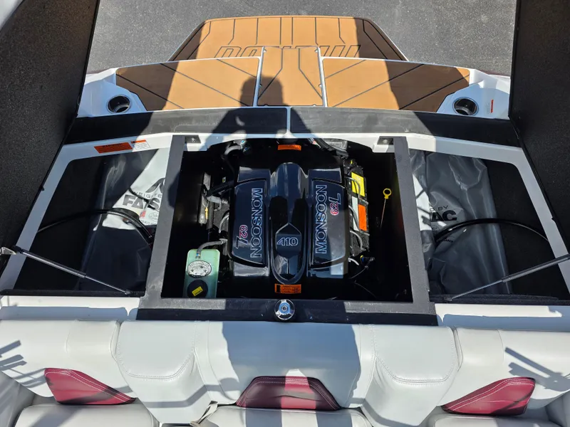 Slide: The Image of 2020 Malibu 21VLX boat engine compartment with Monsoon 410 engine. - 13